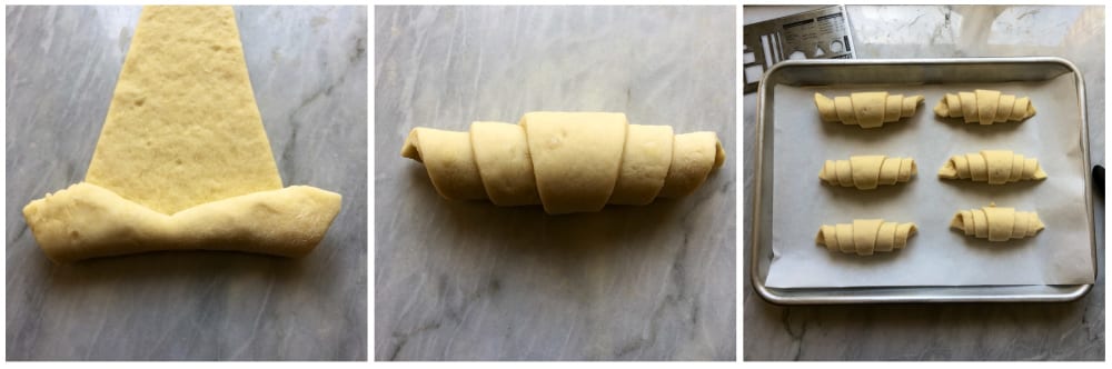 How to make croissants: Rolling up the croissant triangles to make a crescent shape. 